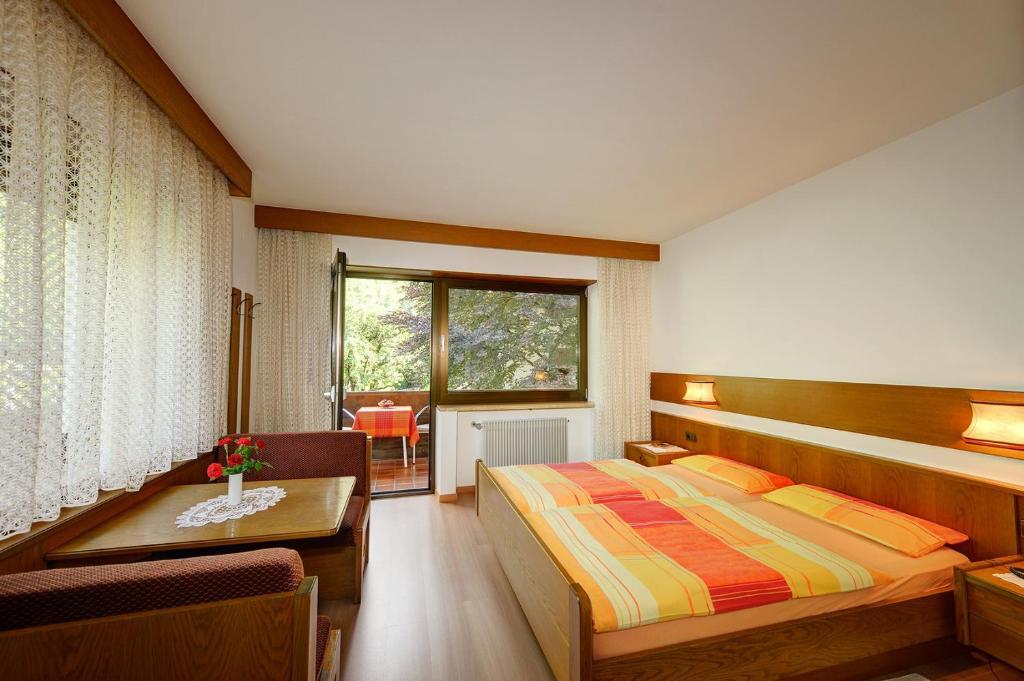 Apparthotel Taufenbrunn Parcines Quarto foto